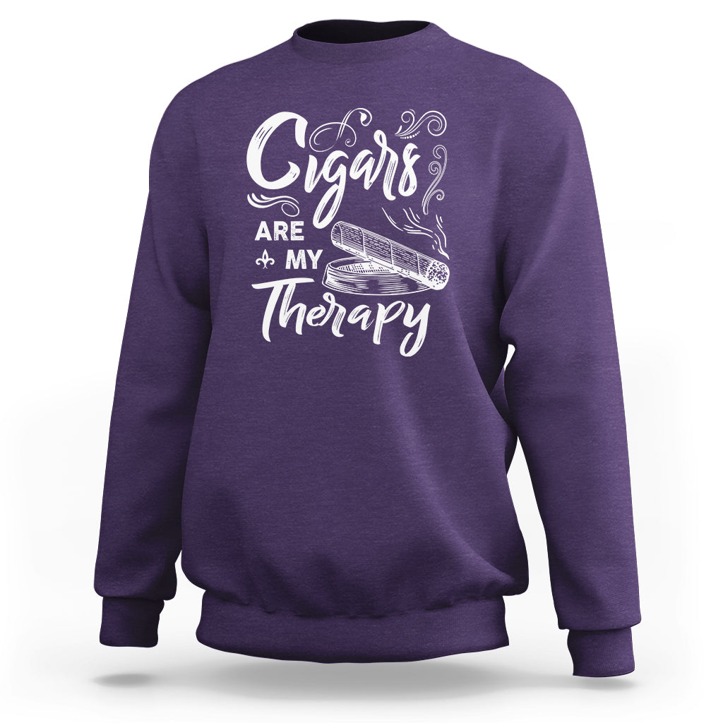 Purple sweatshirt with white cigar slogan graphic on chest