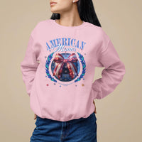 Light pink women's sweatshirt with “American Mama” patriotic wreath graphic