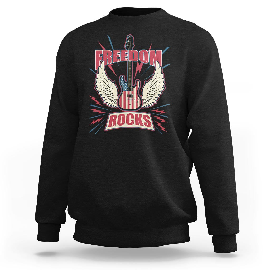 Black crewneck sweatshirt with 'Freedom Rocks' graphic and winged guitar