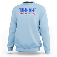 Light blue crewneck sweatshirt with 'UH-OH' England 1776 graphic, long sleeves