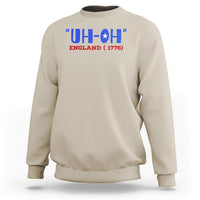 Sand crewneck sweatshirt with 'UH-OH' England 1776 graphic, long sleeves