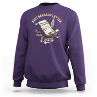 Purple sweatshirt with “Best Breakup Letter Ever” graphic on chest