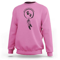 Azalea pink sweatshirt with circular hand and dreamcatcher-style graphic on chest