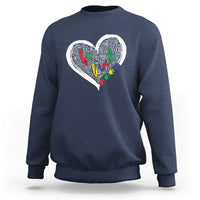Navy sweatshirt with large white heart graphic and colorful message text art