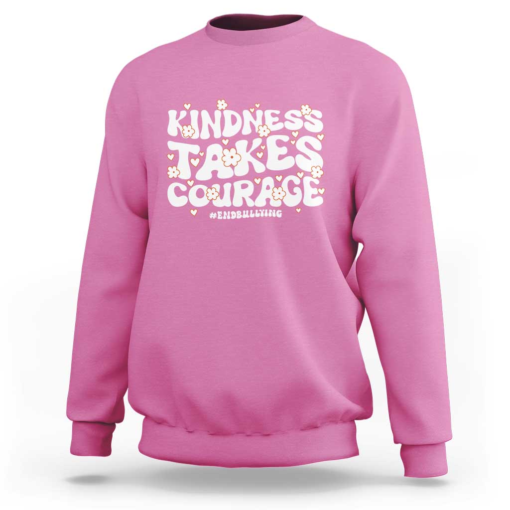Azalea pink crewneck sweatshirt with “Kindness Takes Courage” anti-bullying graphic
