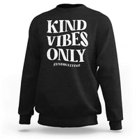 Black sweatshirt with “KIND VIBES ONLY” slogan graphic and #END BULLYING text