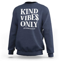 Navy sweatshirt with “KIND VIBES ONLY” slogan graphic and #END BULLYING text