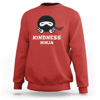 Red sweatshirt with Kindness Ninja front graphic