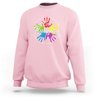 Light pink crewneck sweatshirt with "End Bullying" rainbow hands graphic on chest