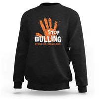 Black sweatshirt with front STOP BULLYING graphic and orange hand illustration