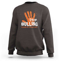 Charcoal gray sweatshirt with front STOP BULLYING graphic and orange hand illustration