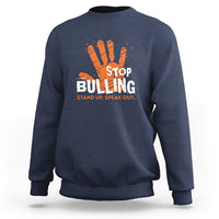 Navy sweatshirt with front STOP BULLYING graphic and orange hand illustration