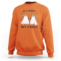 Orange crewneck sweatshirt with “Be a Buddy Not a Bully” cowboy ghost graphic