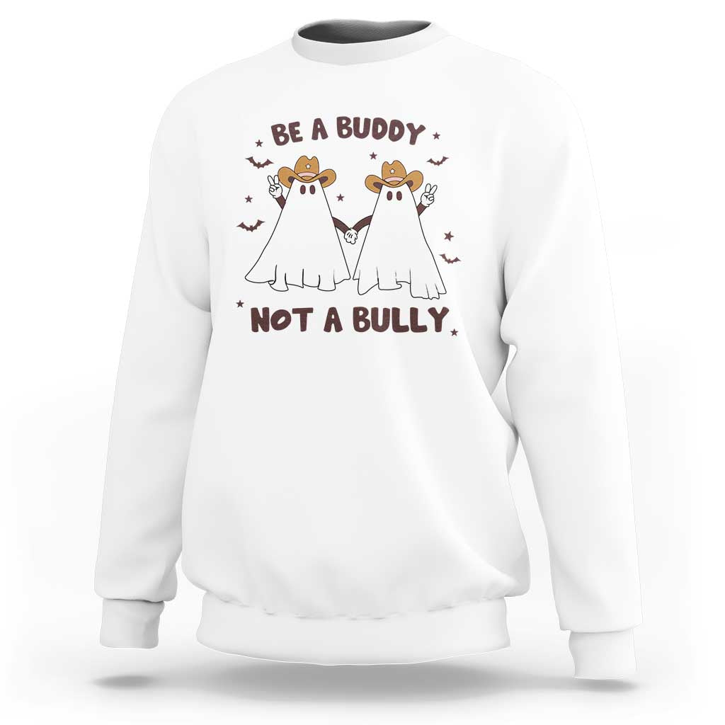 White crewneck sweatshirt with “Be a Buddy Not a Bully” cowboy ghost graphic