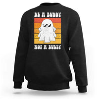 Anti-bullying sweatshirt in black with white ghost graphic and “Be A Buddy Not A Bully” slogan