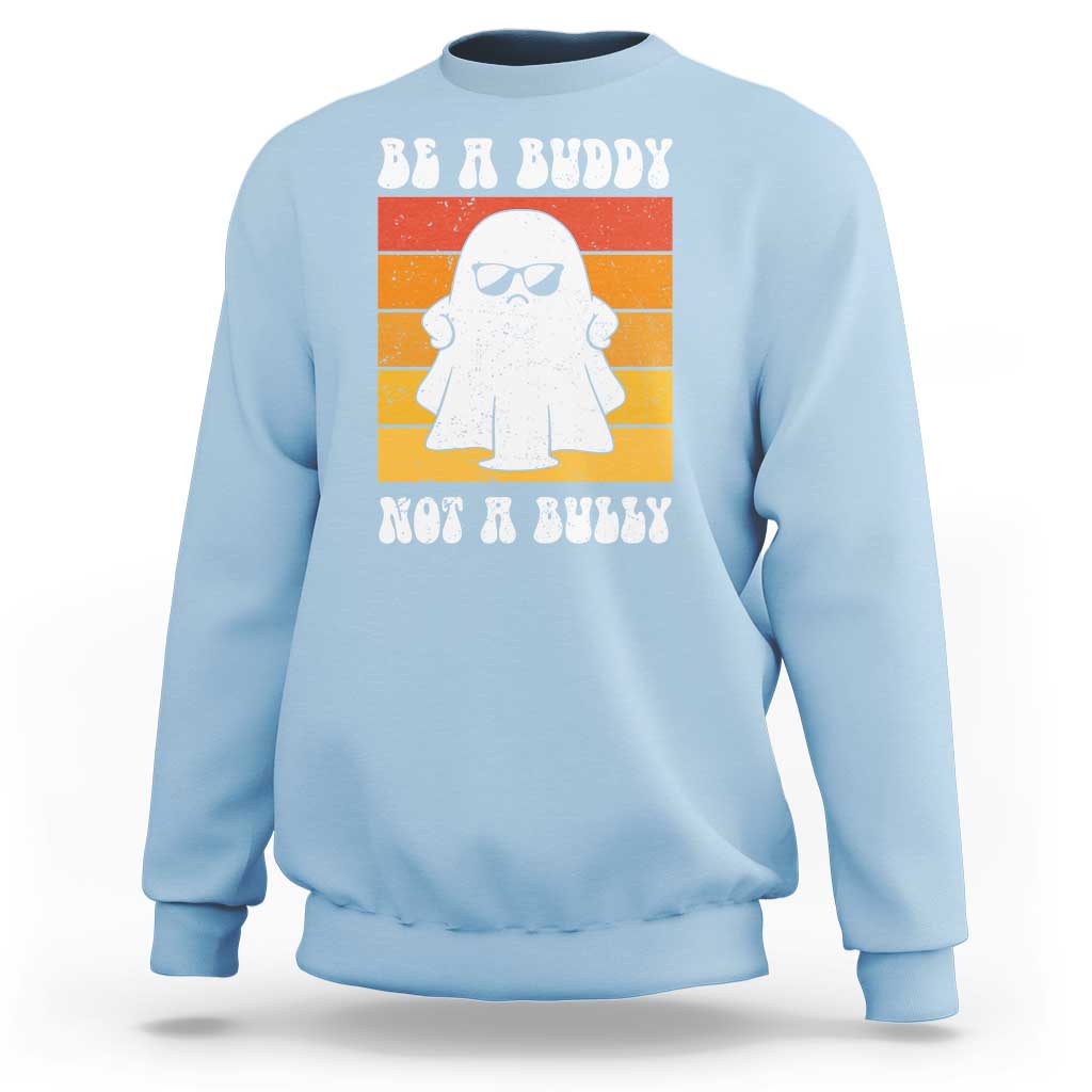 Anti-bullying sweatshirt in light blue with white ghost graphic and “Be A Buddy Not A Bully” print