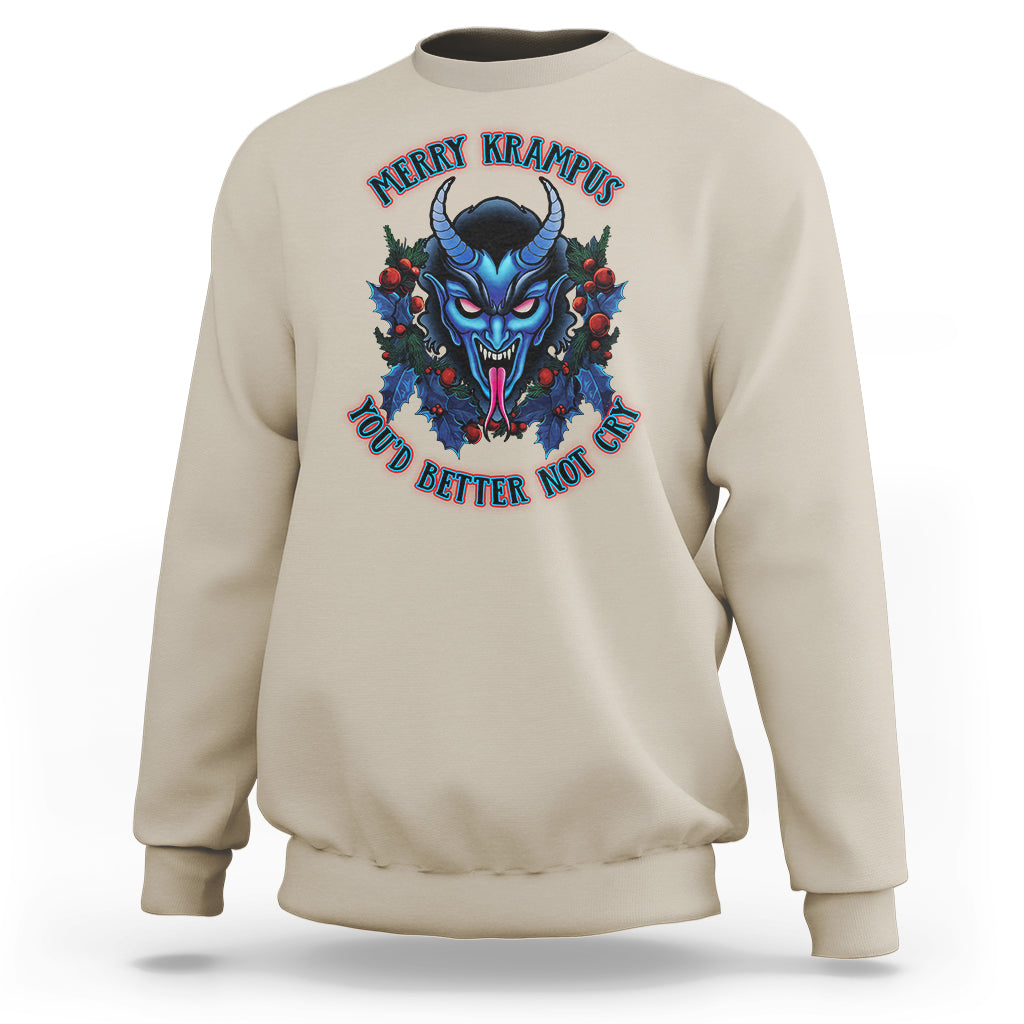 Sand beige crewneck sweatshirt with colorful Krampus face graphic on front.