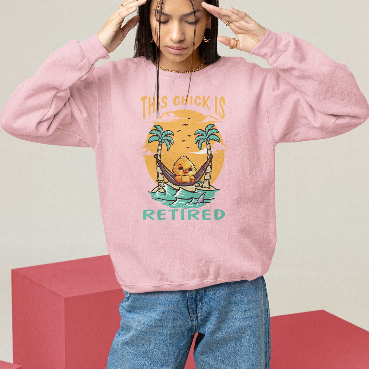 Women's light pink sweatshirt with “THIS CHICK IS RETIRED” palm graphic, long sleeves