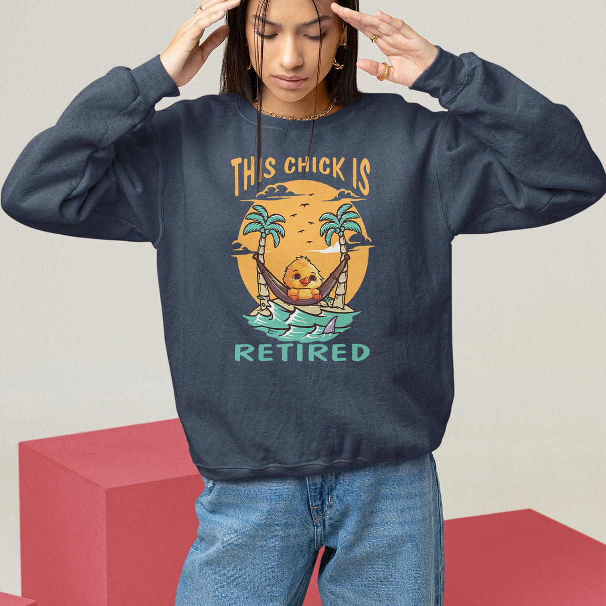 Women's navy sweatshirt with “THIS CHICK IS RETIRED” palm graphic, crewneck, long sleeves