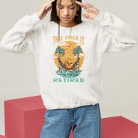 Women's white sweatshirt with “THIS CHICK IS RETIRED” palm graphic, crewneck pullover