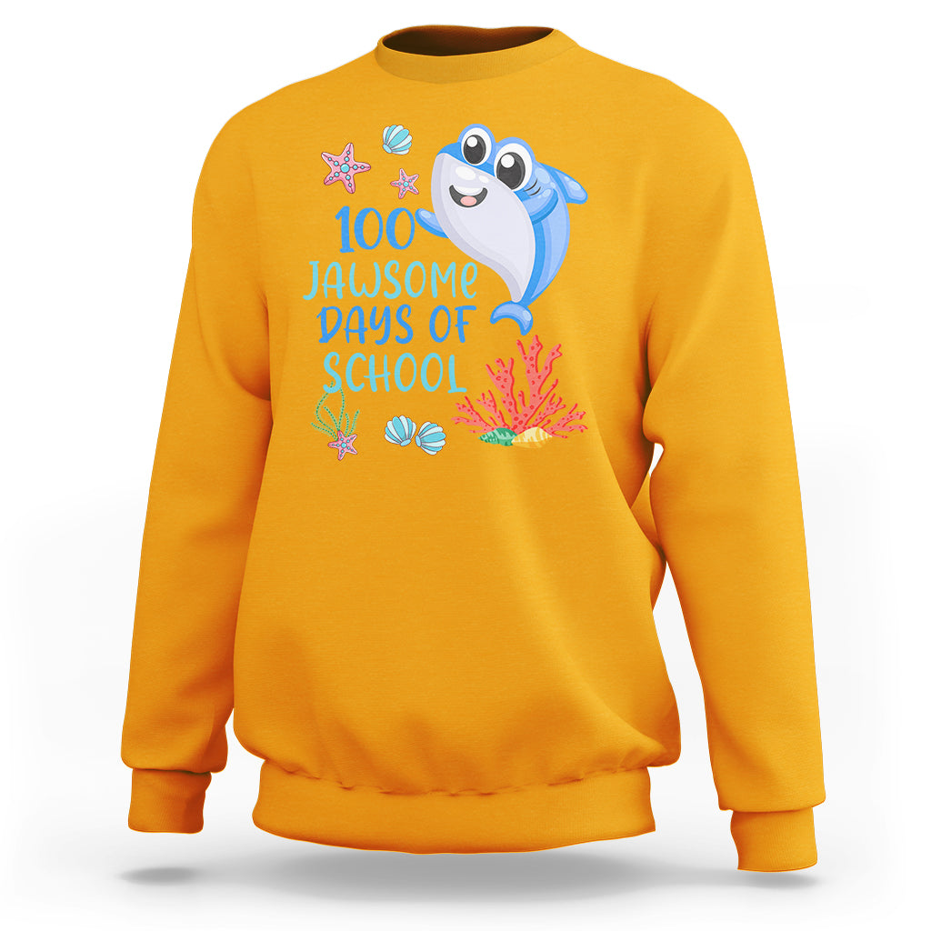 Gold crewneck sweatshirt with blue shark graphic and '100 Jawsome Days of School' text