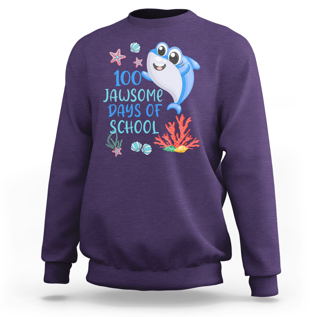 Purple crewneck sweatshirt with blue shark graphic and '100 Jawsome Days of School' text