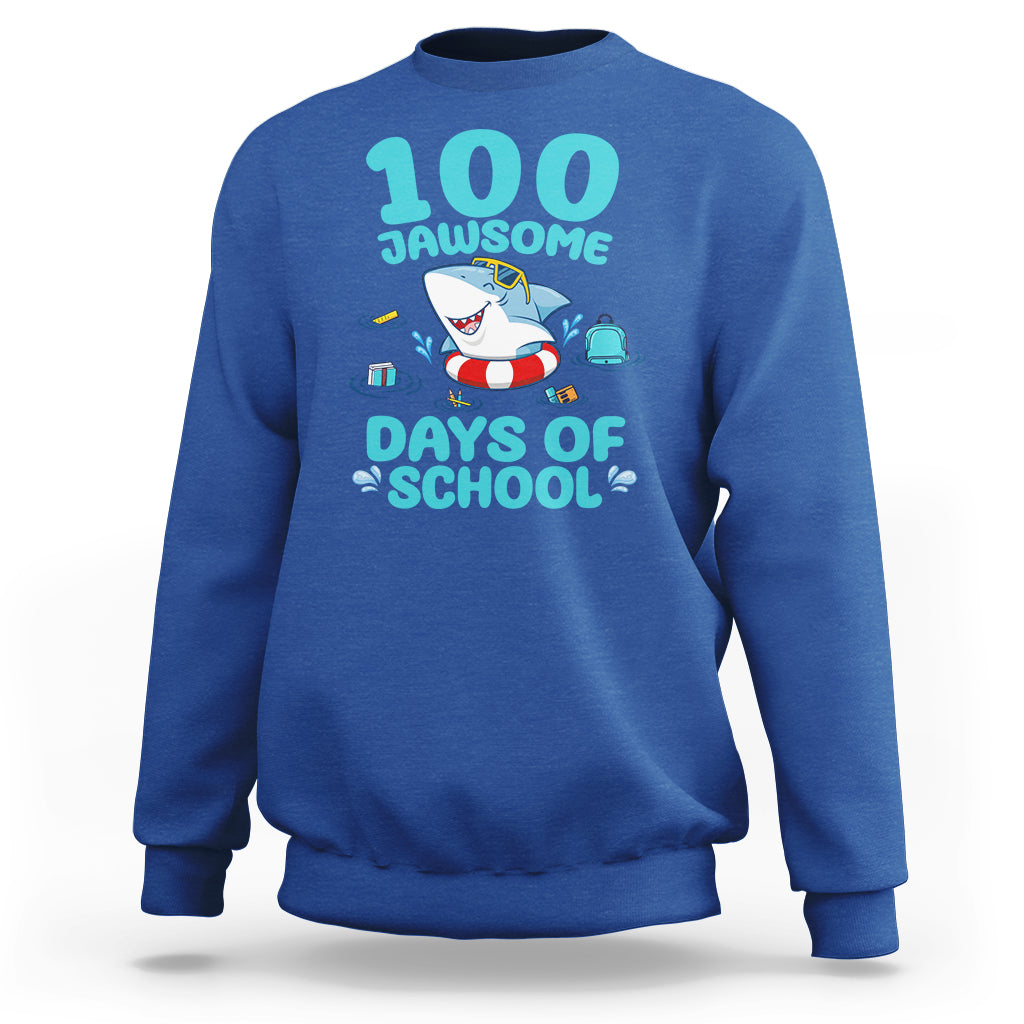 Royal blue crewneck sweatshirt with shark cartoon and 100 Jawsome Days of School print