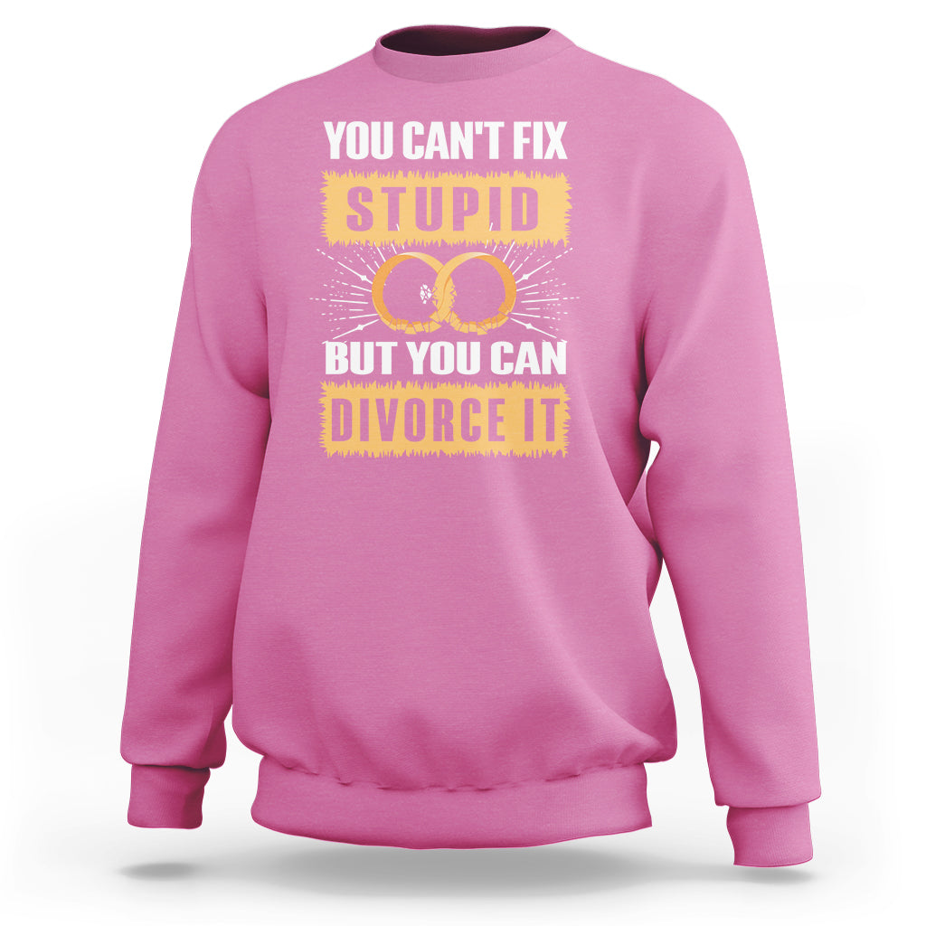 Pink sweatshirt with “You Can’t Fix Stupid” divorce graphic on front