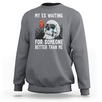 Light gray crewneck sweatshirt with skeleton and butterfly graphic plus white slogan text