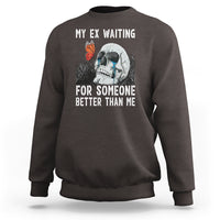 Charcoal crewneck sweatshirt with skeleton and butterfly graphic plus white slogan text
