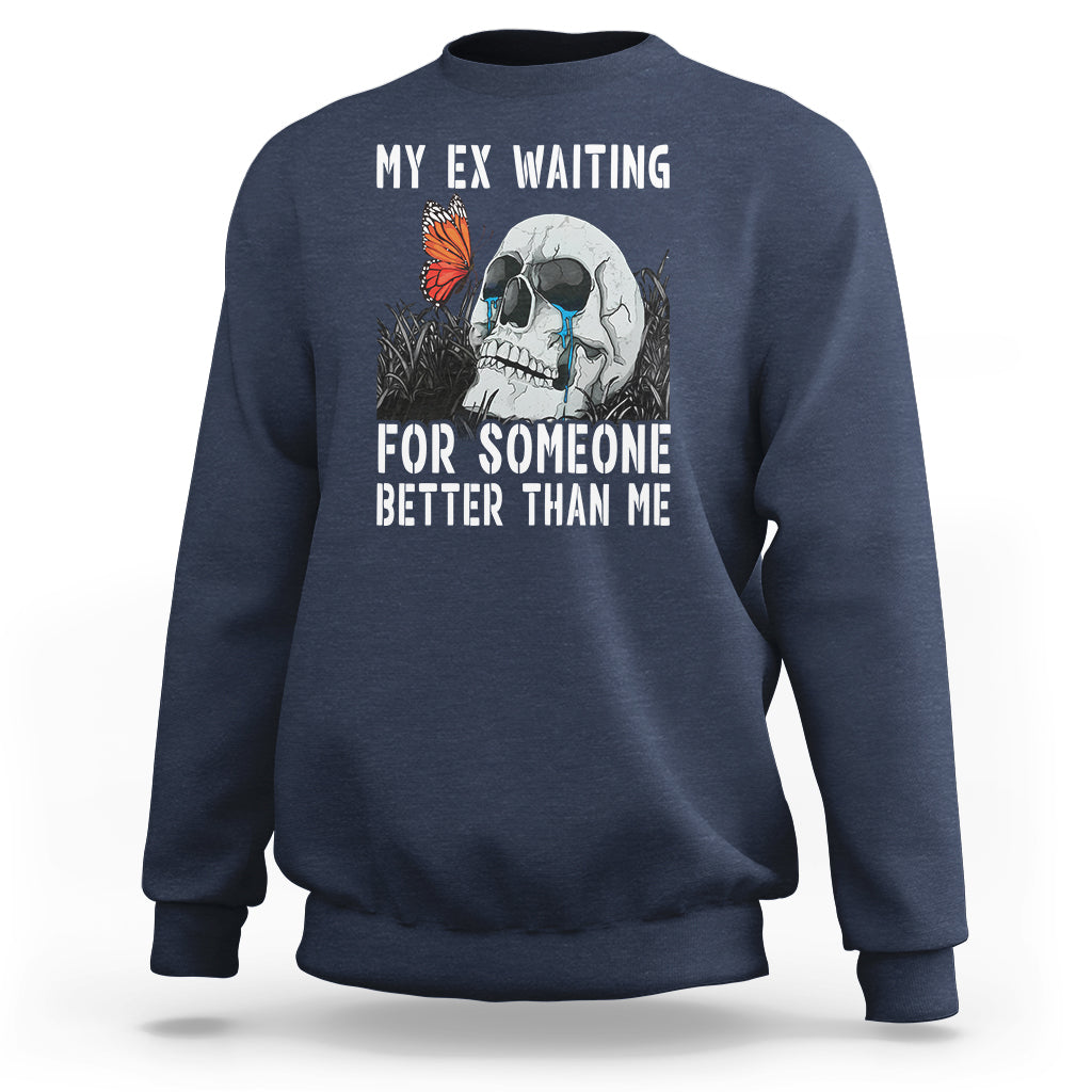 Navy crewneck sweatshirt with skeleton and butterfly graphic plus white slogan text