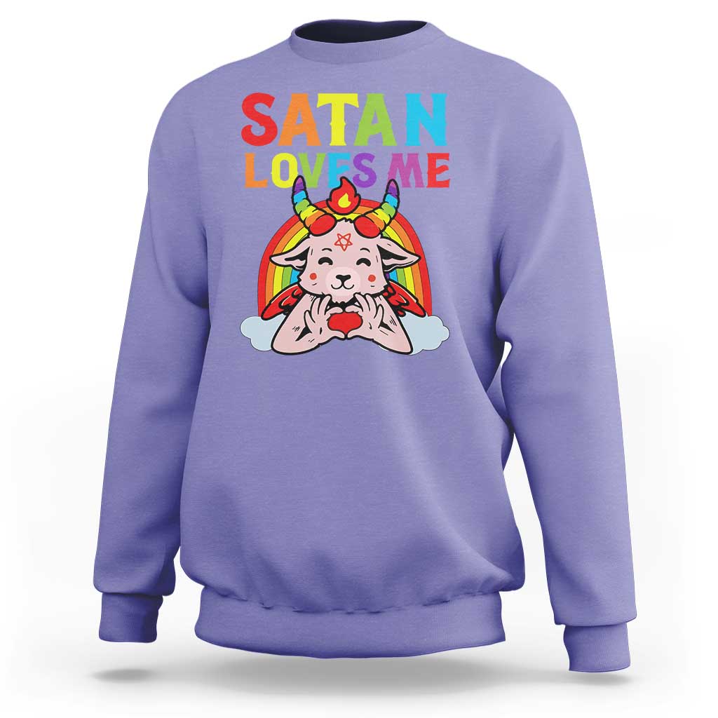 Violet sweatshirt with “SATAN LOVES ME” rainbow goat graphic, long sleeves