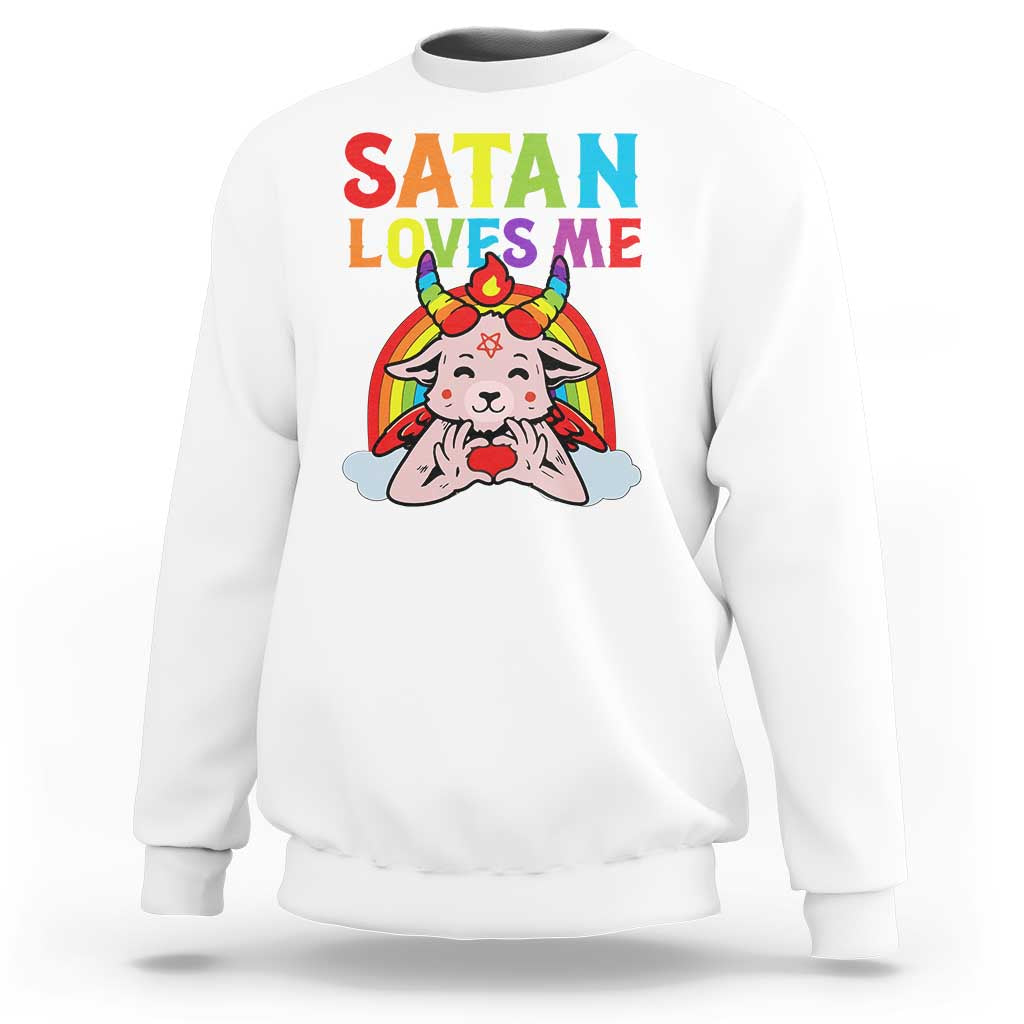 White sweatshirt with “SATAN LOVES ME” rainbow goat graphic, long sleeves