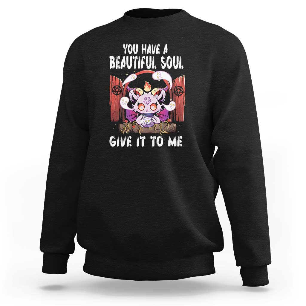 Black Halloween sweatshirt with back graphic and slogan “You have a beautiful soul”.