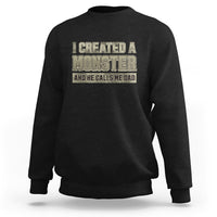 Men's black sweatshirt with 'I created a monster' graphic on front