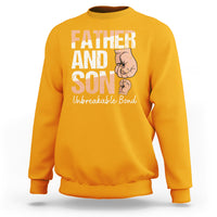 Men's gold sweatshirt with 'FATHER AND SON' graphic and 'Unbreakable Bond' text