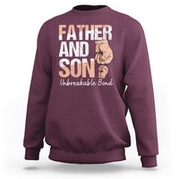 Men's maroon sweatshirt with 'FATHER AND SON' graphic and 'Unbreakable Bond' text