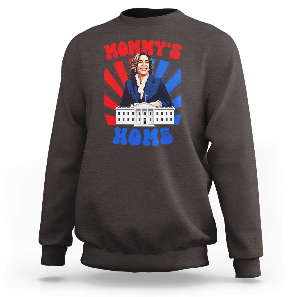 Dark chocolate crewneck sweatshirt with “MOMMY’S HOME” graphic featuring a woman and building.