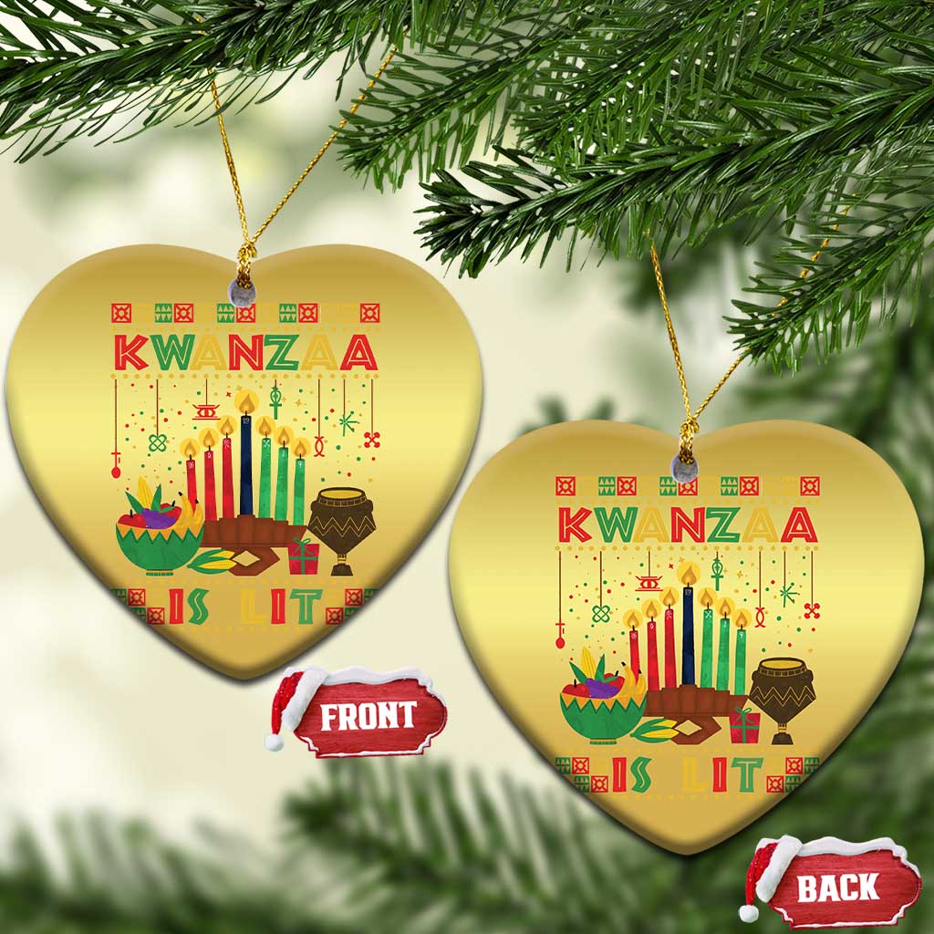 Two gold heart-shaped Kwanzaa ornaments hanging on branches, with “Kwanzaa” text