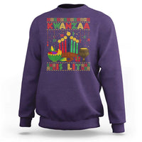 Purple Kwanzaa sweatshirt with colorful front “Kwanzaa is lit” graphic