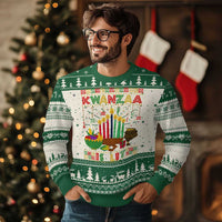 Green crewneck knit sweater with Kwanzaa graphic, candles, and decorative fair-isle bands