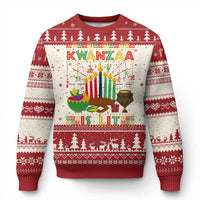 Red crewneck knit sweater with Kwanzaa graphic, candles, trees, and festive border