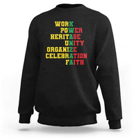 Black crewneck sweatshirt with bold yellow back text: WORK POWER HERITAGE UNITY