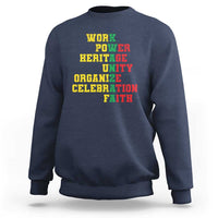 Navy crewneck sweatshirt with bold yellow back text: WORK POWER HERITAGE UNITY