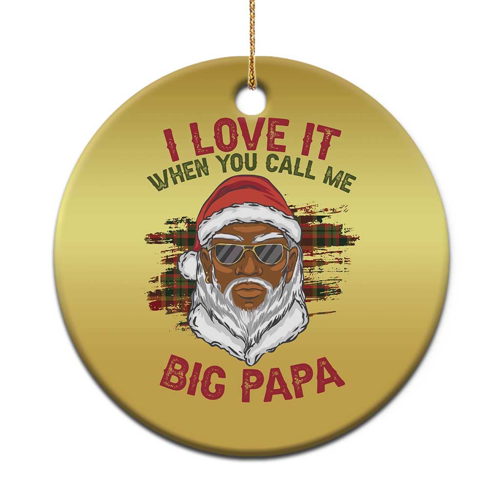 Gold circular ornament with bearded Santa portrait and 'Big Papa' quote.