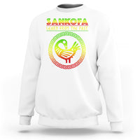 White sweatshirt with colorful SANKOFA graphic and “Learn From The Past” bird emblem