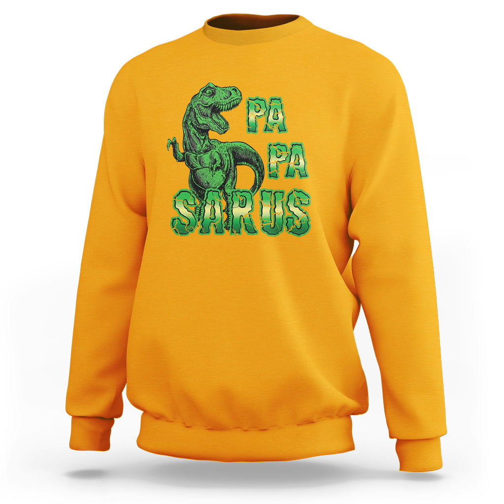 Gold sweatshirt with green dinosaur and "PA PA SAURUS" graphic