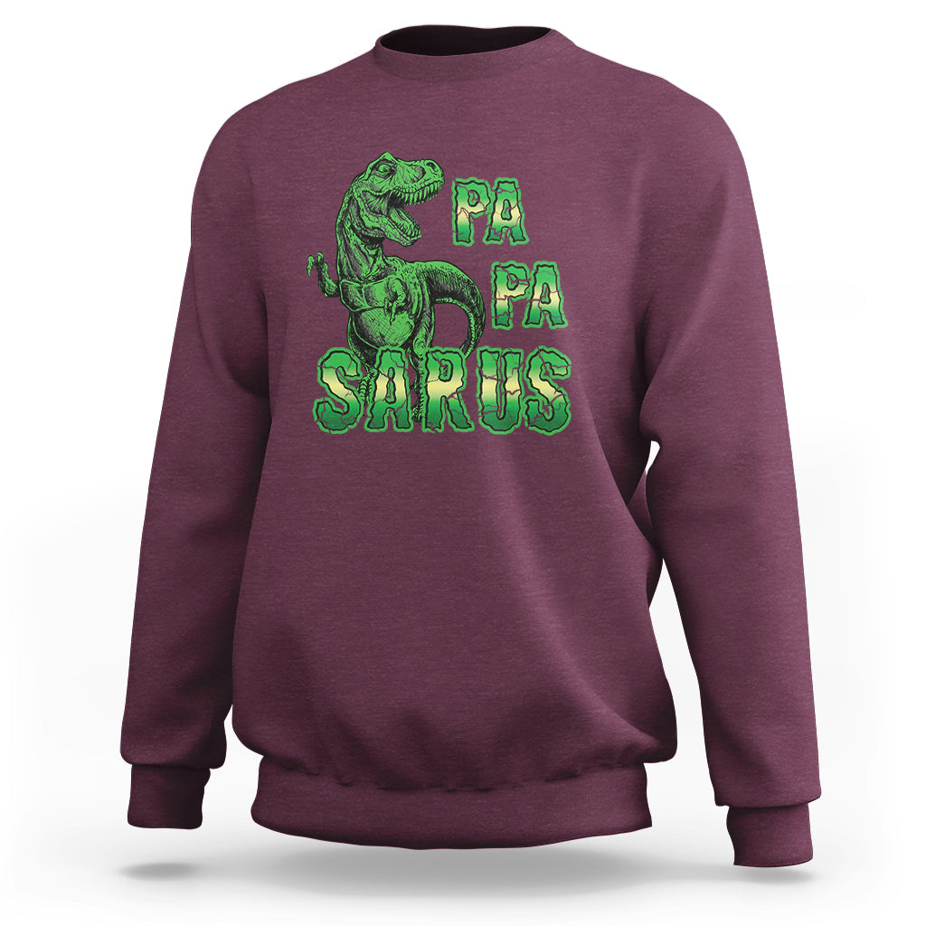 Maroon sweatshirt with green dinosaur and "PA PA SAURUS" graphic