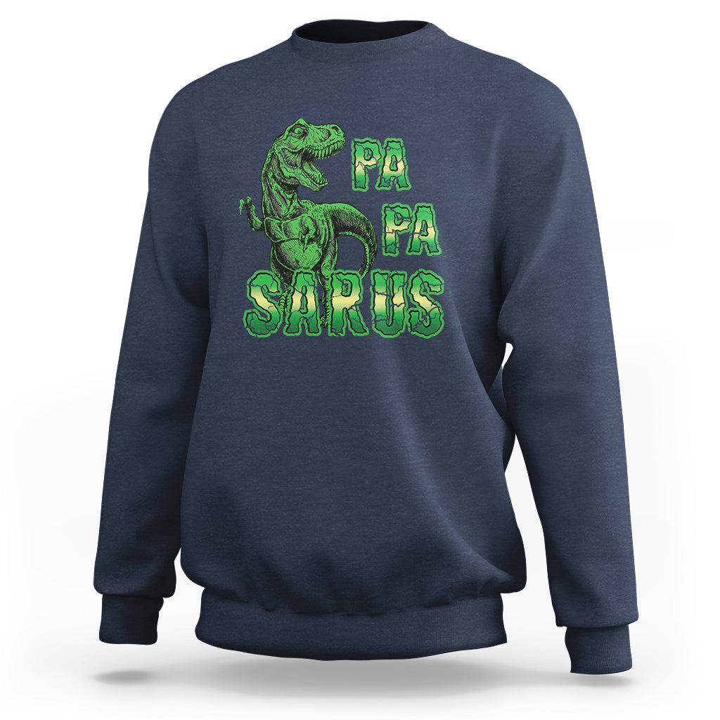 Navy sweatshirt with green dinosaur and "PA PA SAURUS" graphic