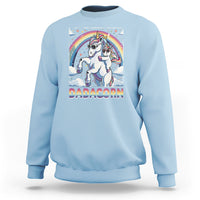 Light blue sweatshirt with unicorn graphic and rainbow arch on the front